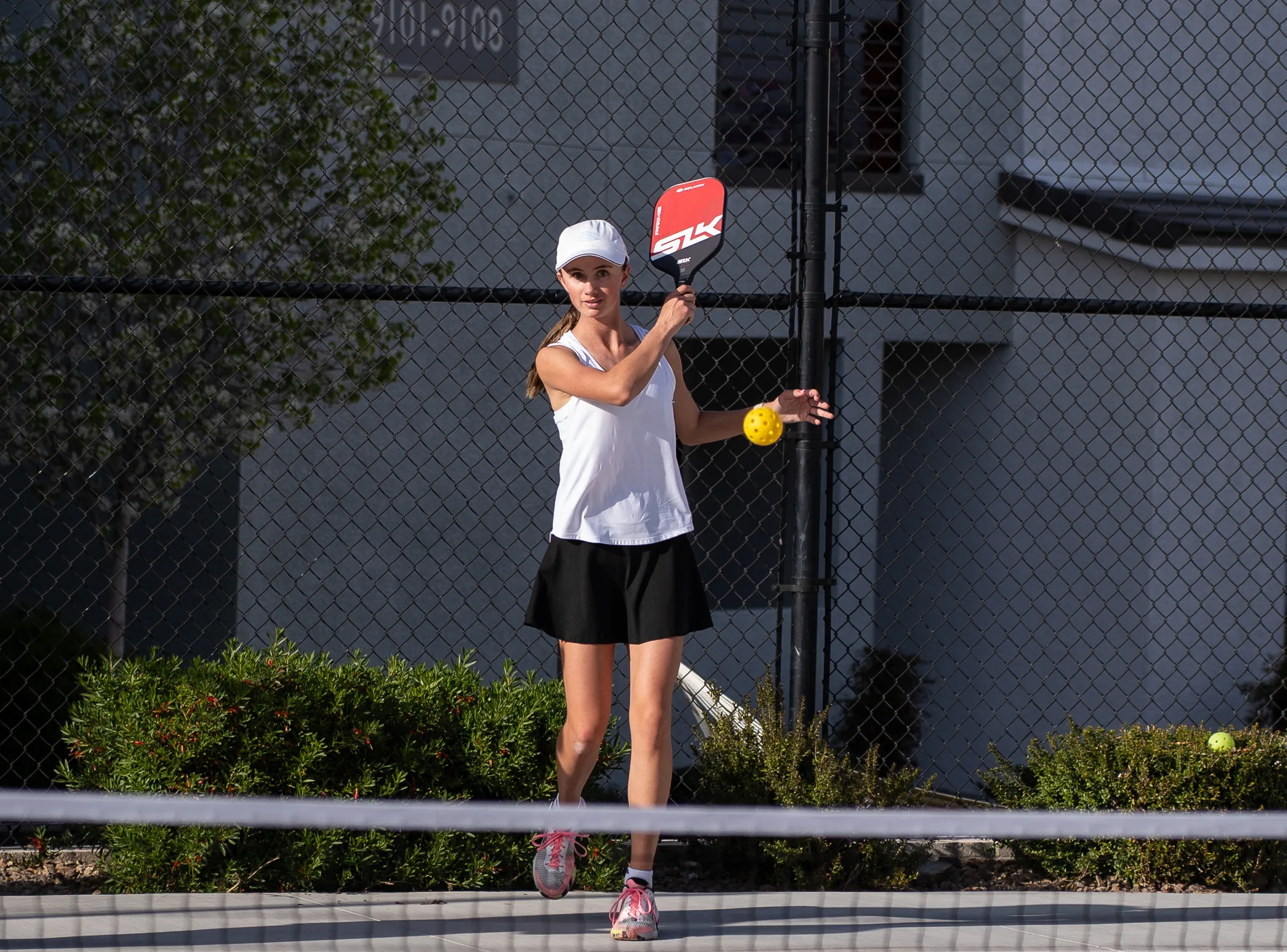 pickleball return a serve.webp